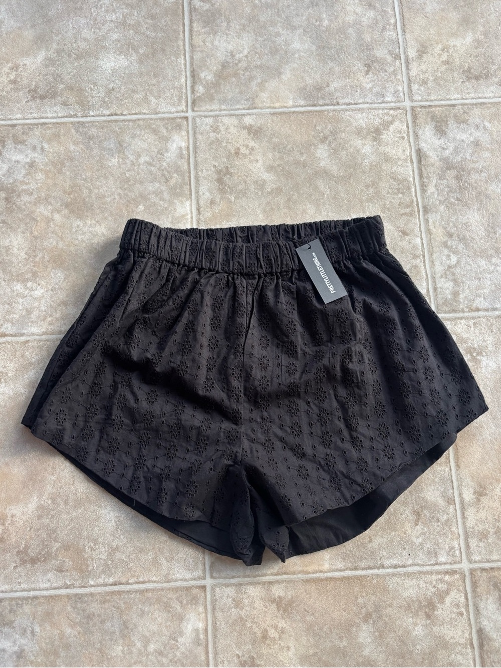 PrettyLittleThing Black Eyelet Elastic-Waist Shorts